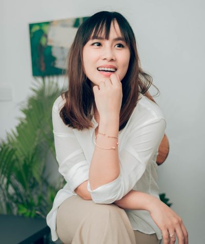 woman in white long sleeve shirt